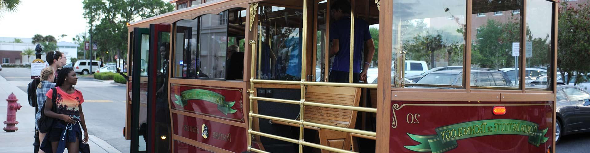 Trolley picking up students